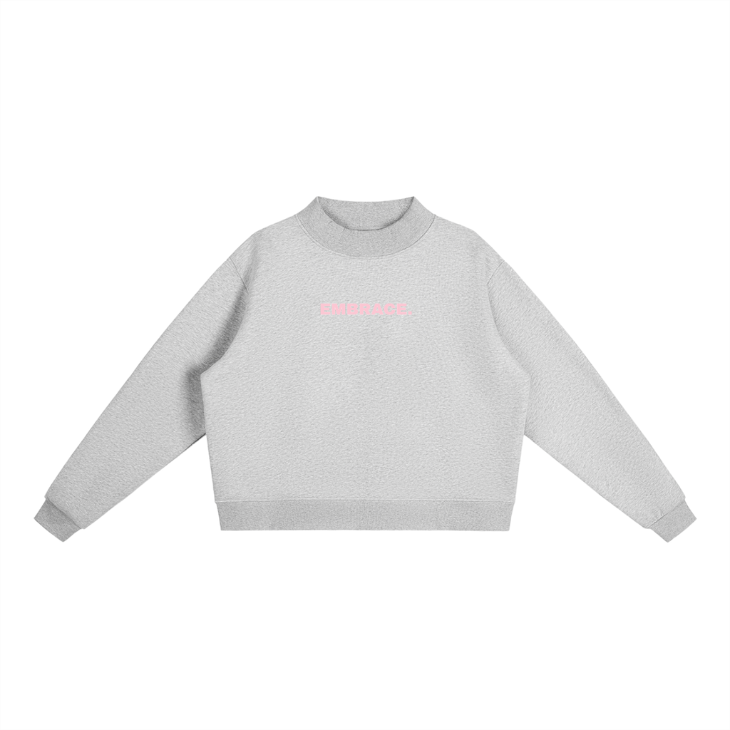 OVERSIZED MOCK-NECK SWEATSHIRT.