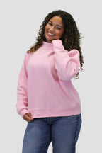 OVERSIZED MOCK-NECK SWEATSHIRT.