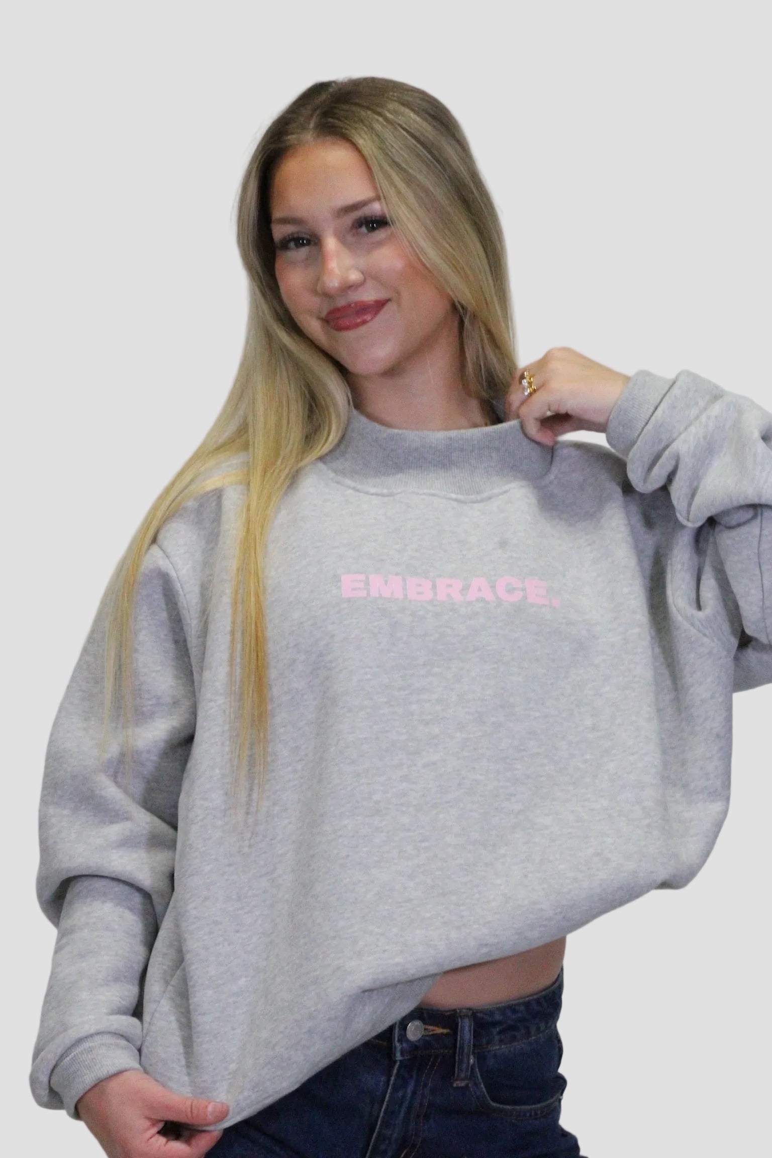 OVERSIZED MOCK-NECK SWEATSHIRT.
